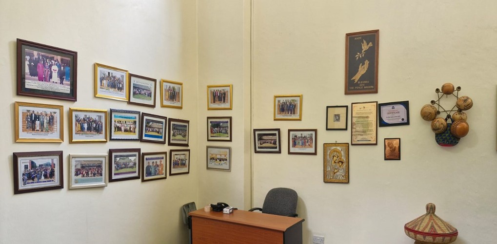 A section of displayed artifacts and pictures in the library