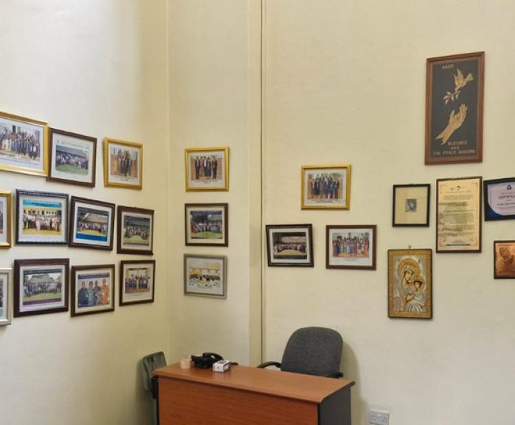 A section of displayed artifacts and pictures in the library