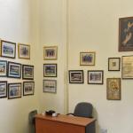 A section of displayed artifacts and pictures in the library